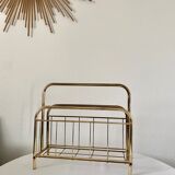 Gilded metal magazine door