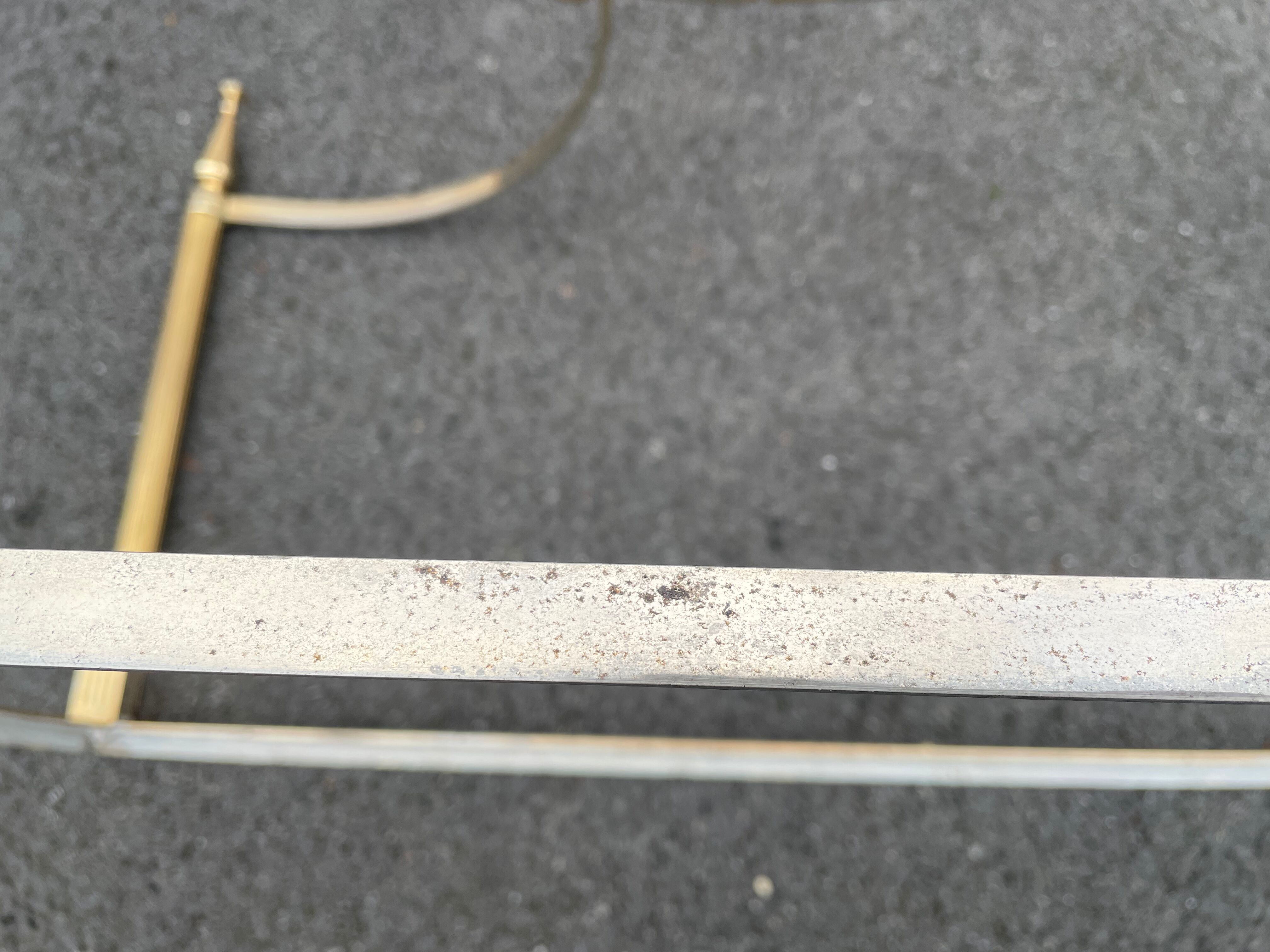 Coffee table in gilded brass and veined green marble