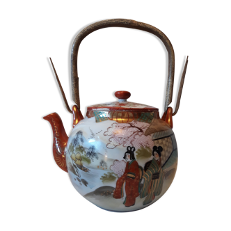 Ancient Japanese teapot in hand-painted porcelain