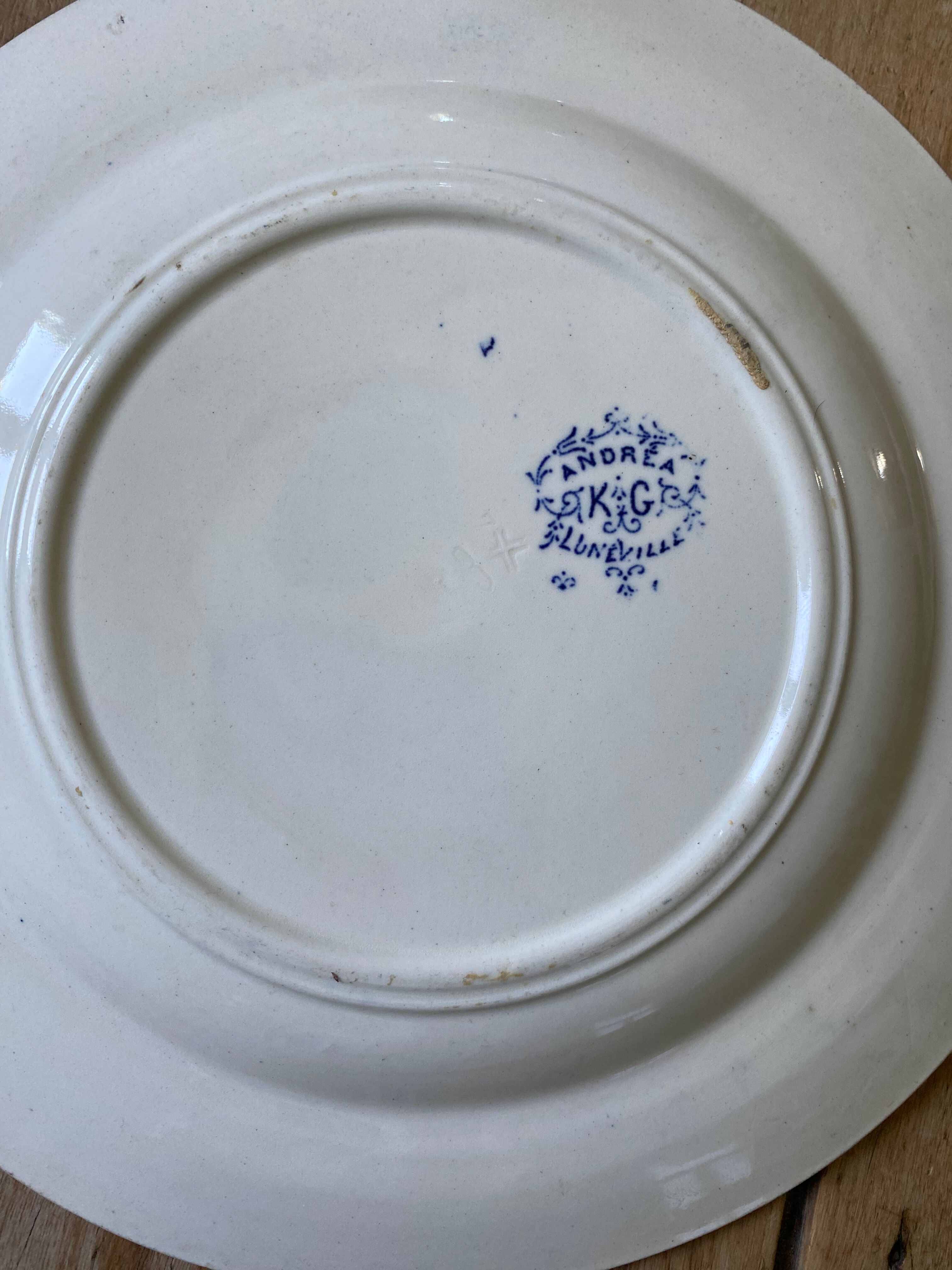 Assiette décor floral bleu KG Luneville
