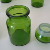 Green vintage set of six jars.