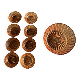 Vintage pink glass service consisting of a salad bowl and 8 small bowls.