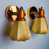 Pair of articulated "Cocoon" wall lights, resin and pine, Italy, 1970