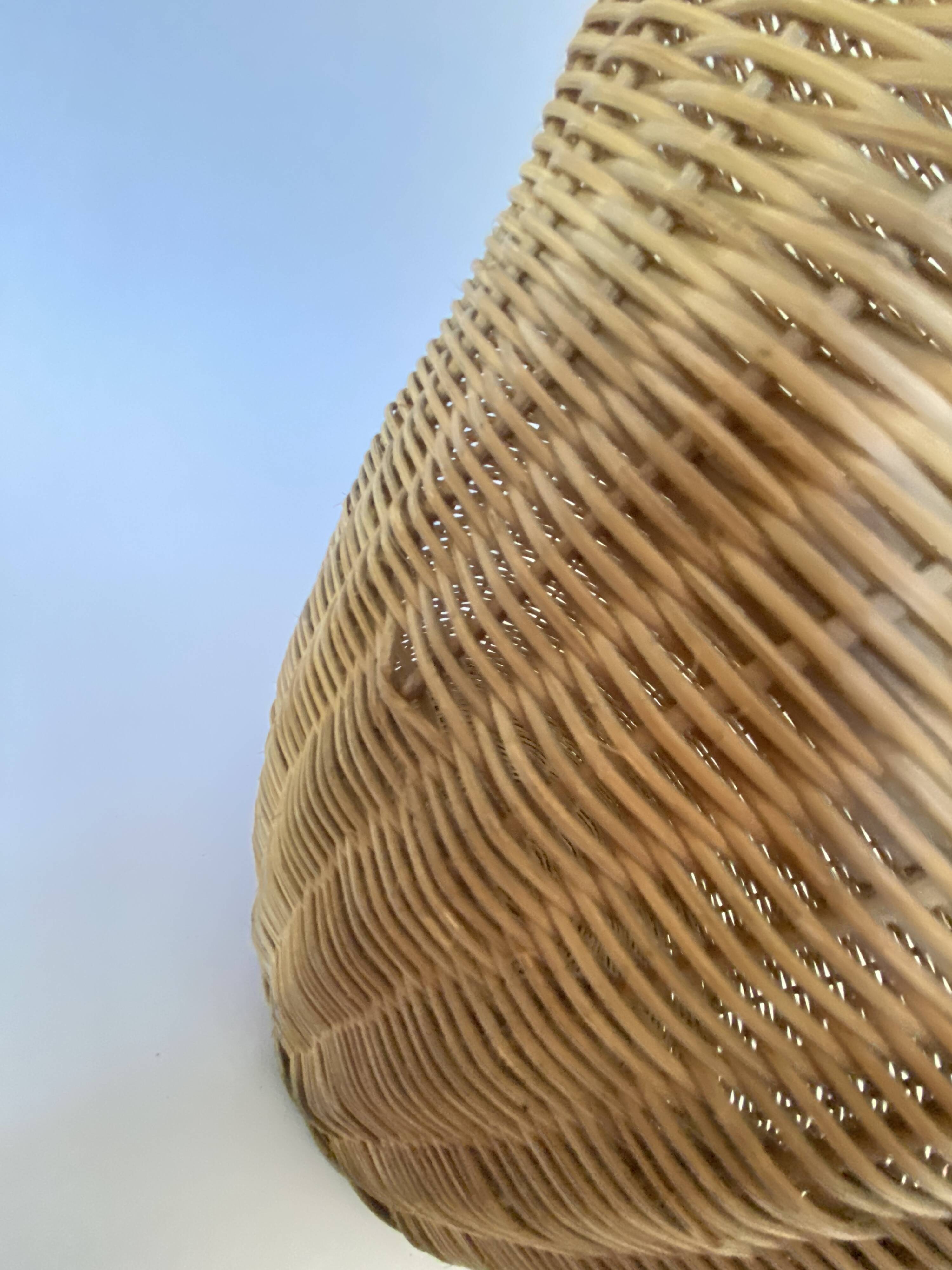 High basket with woven straws