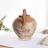 Old water jug. Gargoulette. Old terracotta pitcher.