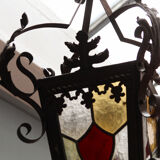 Wrought iron lantern and stained glass windows