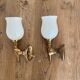 Set of 2 golden, bronze and brass torch wall lights