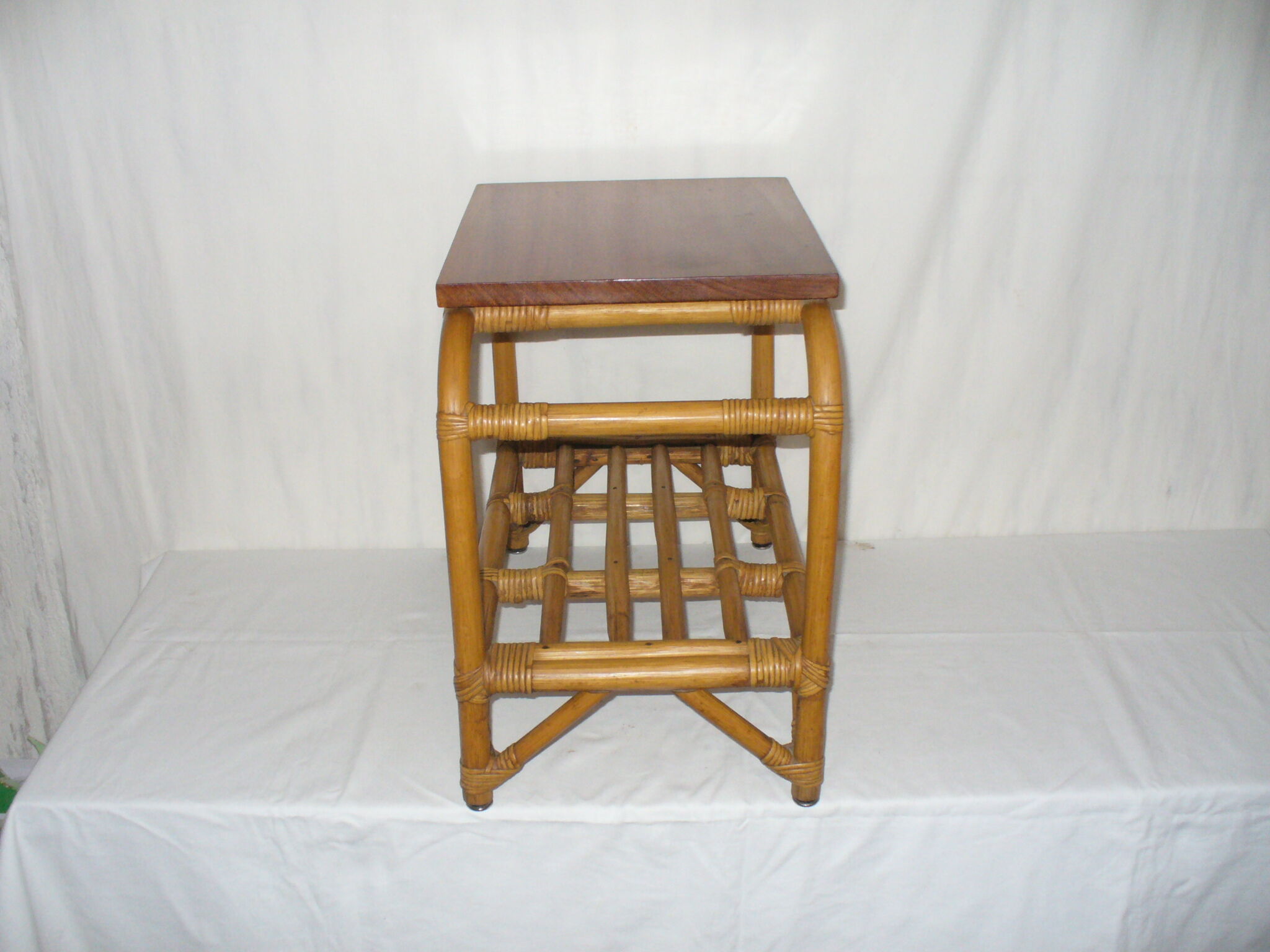 Rattan top bedside table from the 1950s