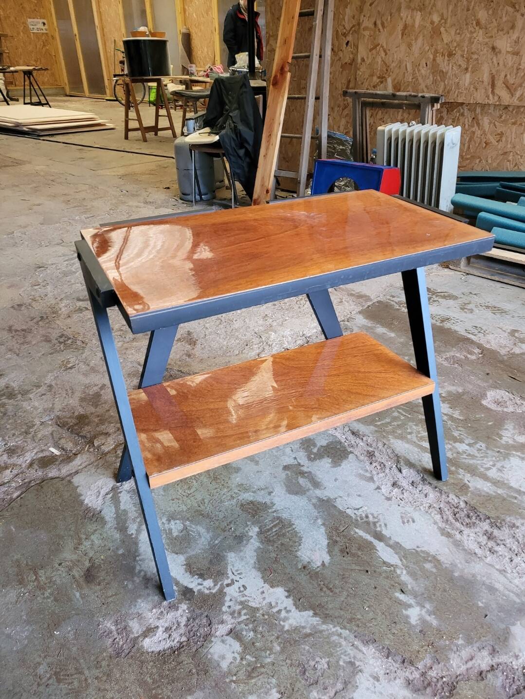 Vintage console design, sleek from the 1960s-70s.