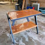 Vintage console design, sleek from the 1960s-70s.