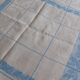 White and sky blue damask tablecloth and 10 towels