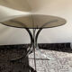 Round table in Italian smoked glass