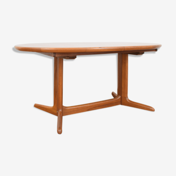 Teak extendable dining table from Skovby