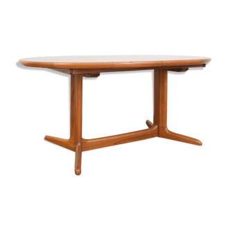 Teak extendable dining table from Skovby