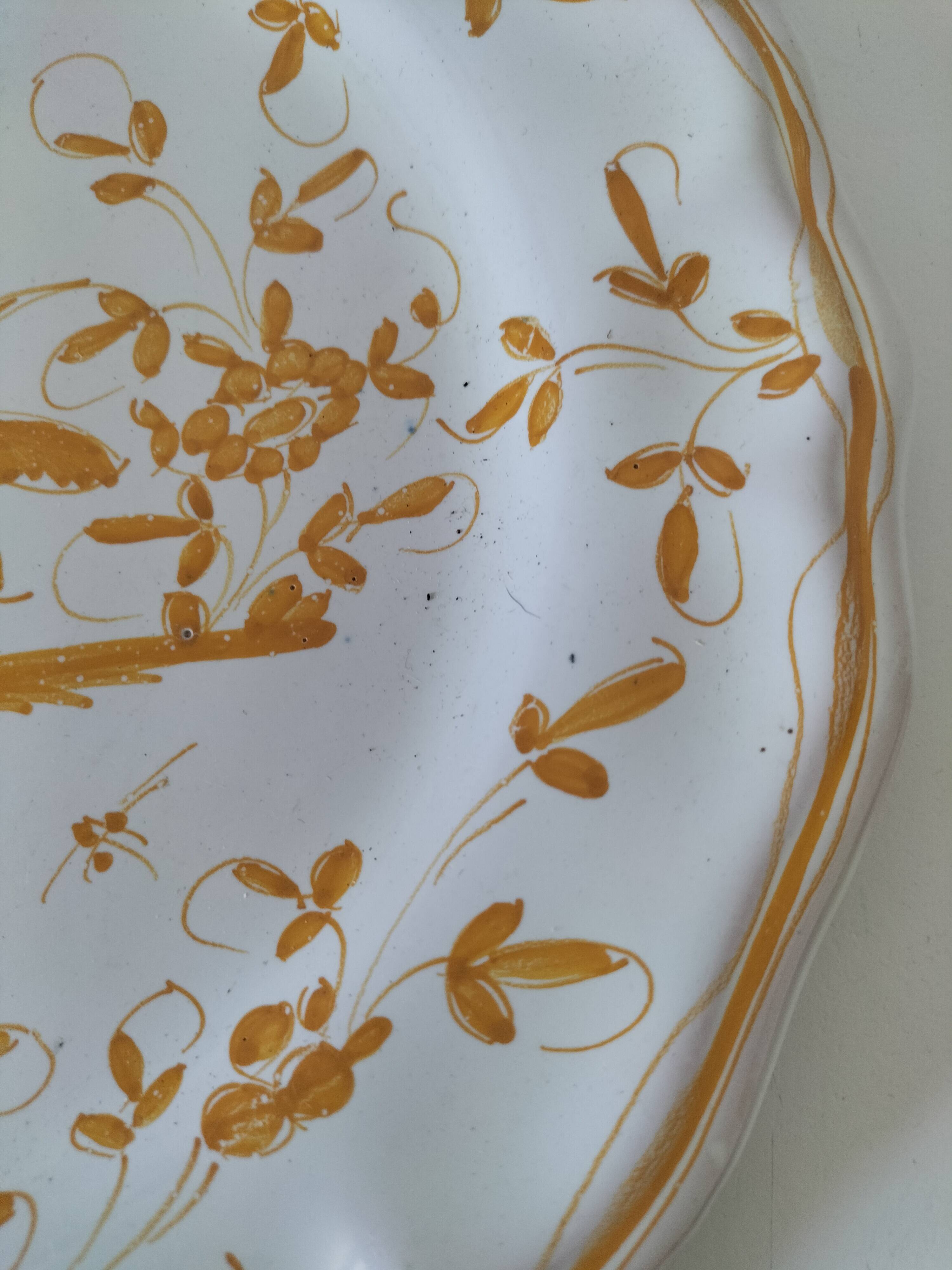 Earthenware plate from Martres-Tolosane, Moustiers decoration, hand-painted.