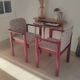 2 fauteuils léopard / bois massif bordeaux
