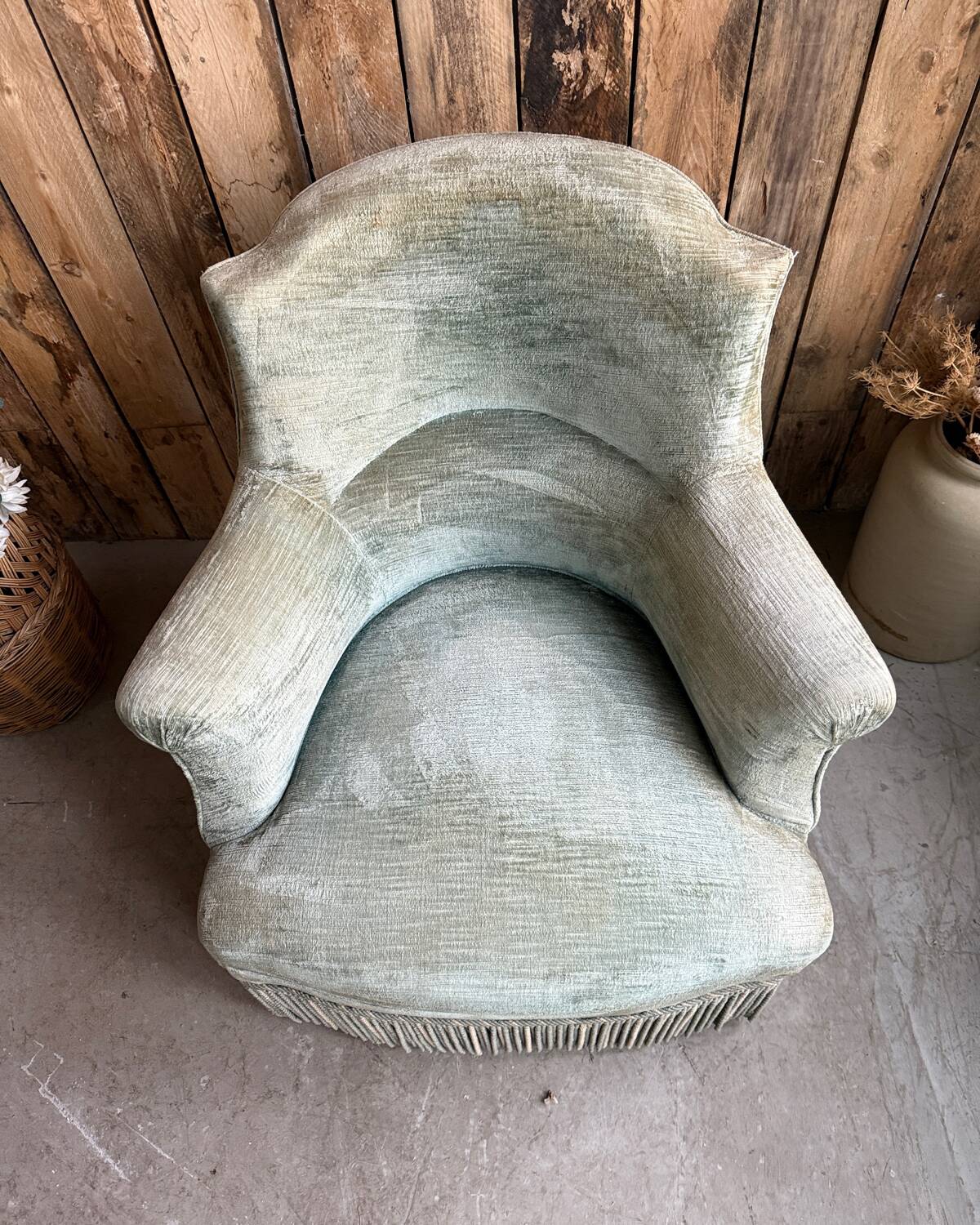 Green velvet tub chair