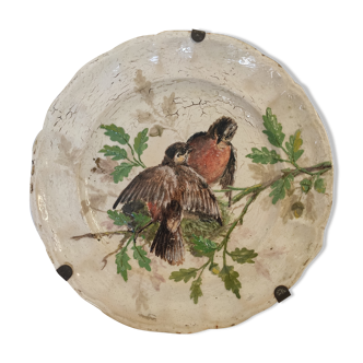 Decorative old plate bird motif