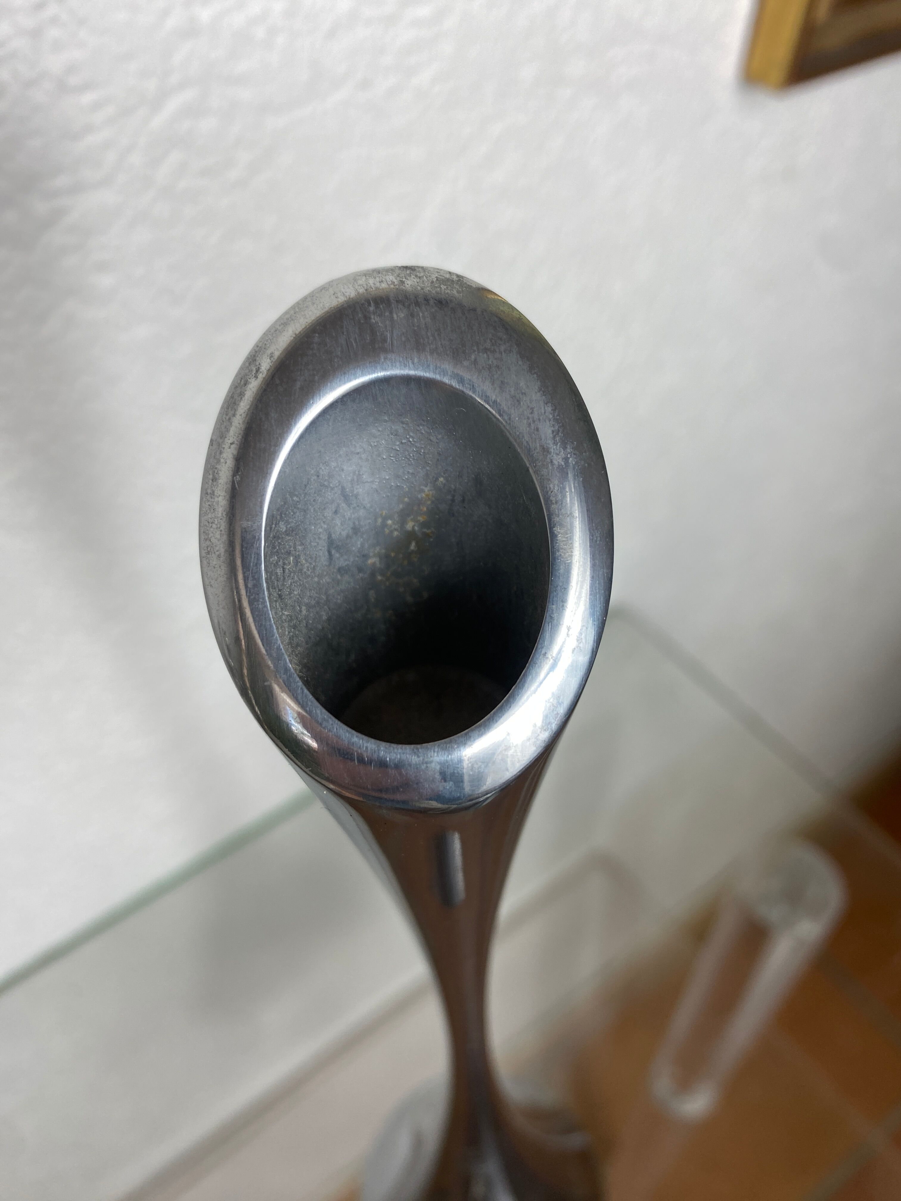 Pair of designer candle holders in stainless steel
