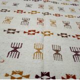 Handmade Berber patterned rug in natural wool