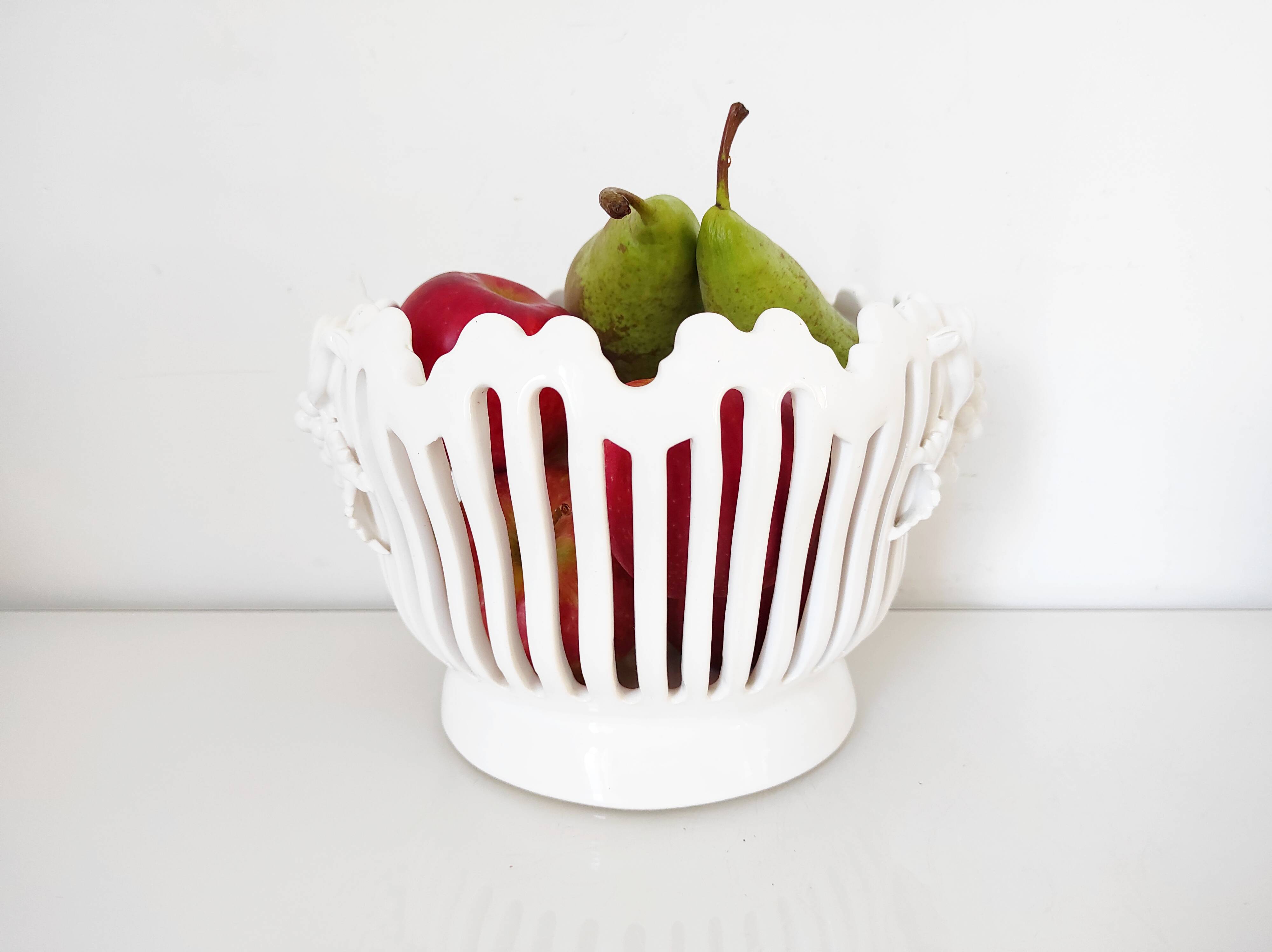 Openwork earthenware fruit bowl with grape decoration