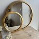 Miroir rond doré vintage