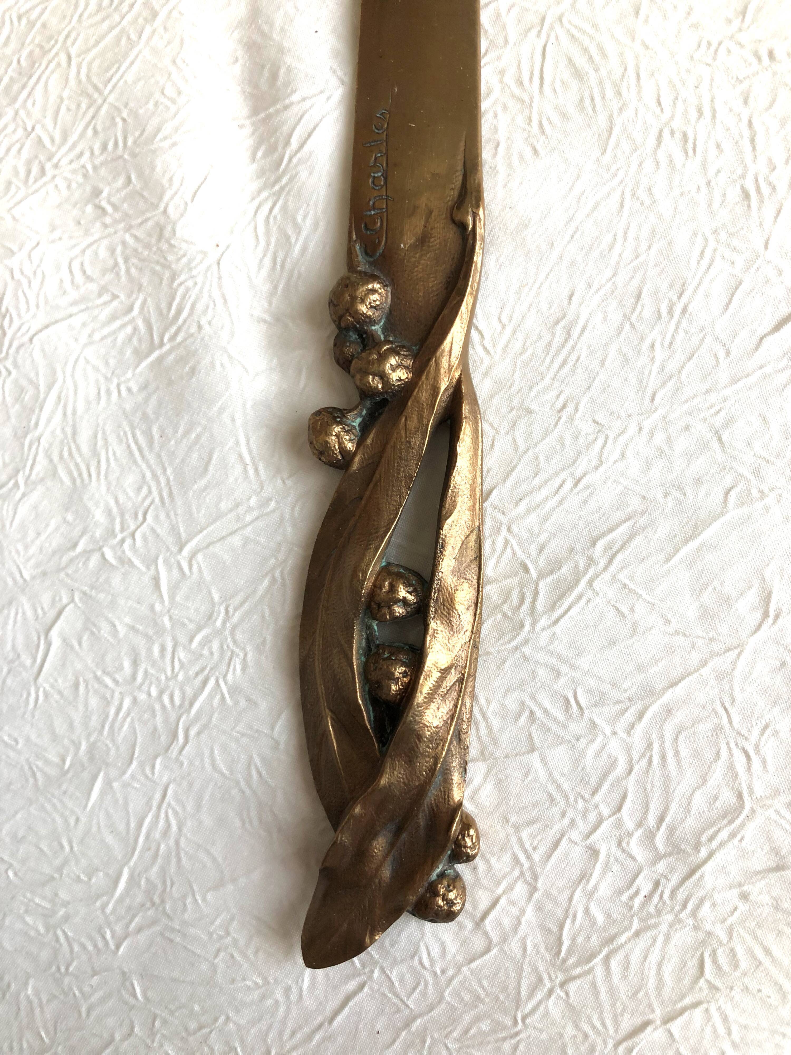 Opens letters cut bronze paper signed