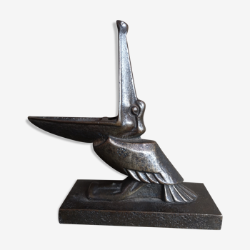 Iron paper press wrought by E. Brandt in the shape of a pelican.
