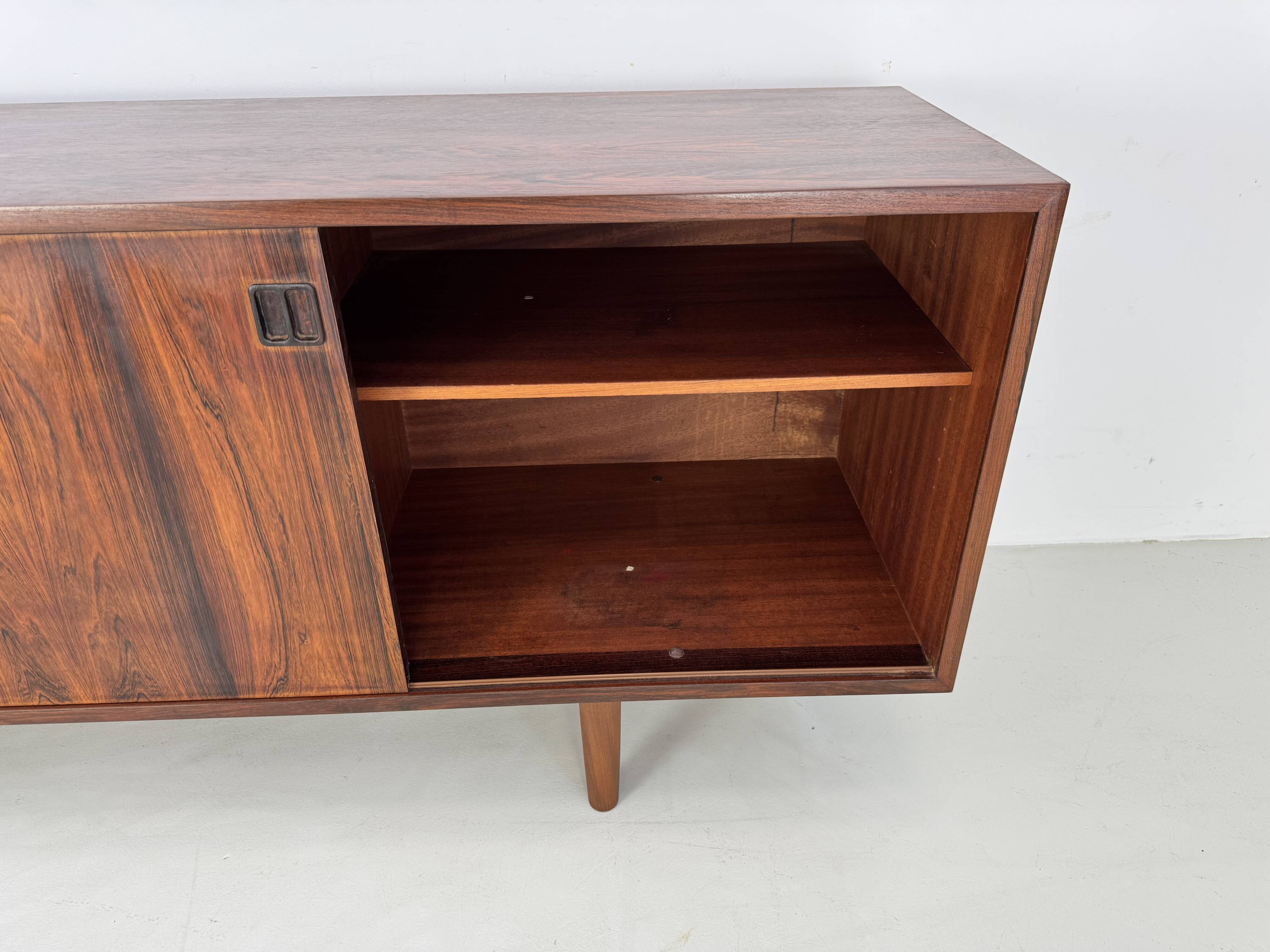 Danish rosewood vintage sideboard with sliding teak doors from the 1960s