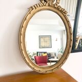 Ancien miroir ovale à fronton