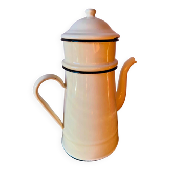 Old cream-colored enameled coffee pot