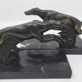 Pair of bookends, greyhounds in babbitt on black marble, Art Deco early 20th century