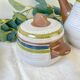 Vintage 1950s speckled stoneware coffee set with grey, green, and blue stripes