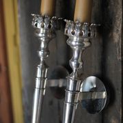 Large pair of silver-plated wall lights with flame globes, torches.