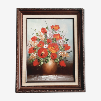 Oil on canvas bouquet of red flowers signed