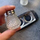 Vintage glass and chrome salt and pepper shaker set.