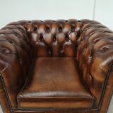 Brown leather chesterfield armchair