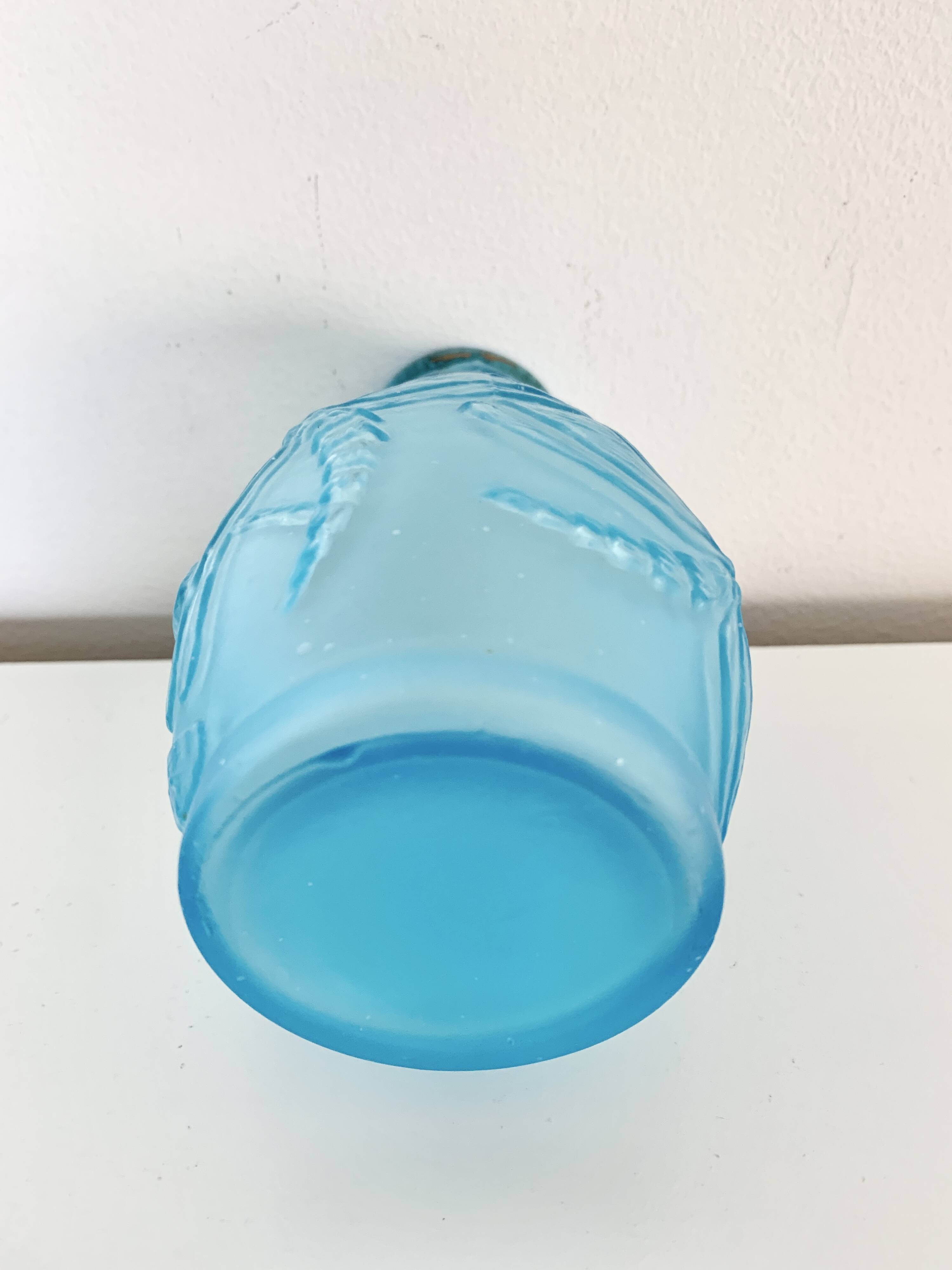 Moulded pressed blue glass vase