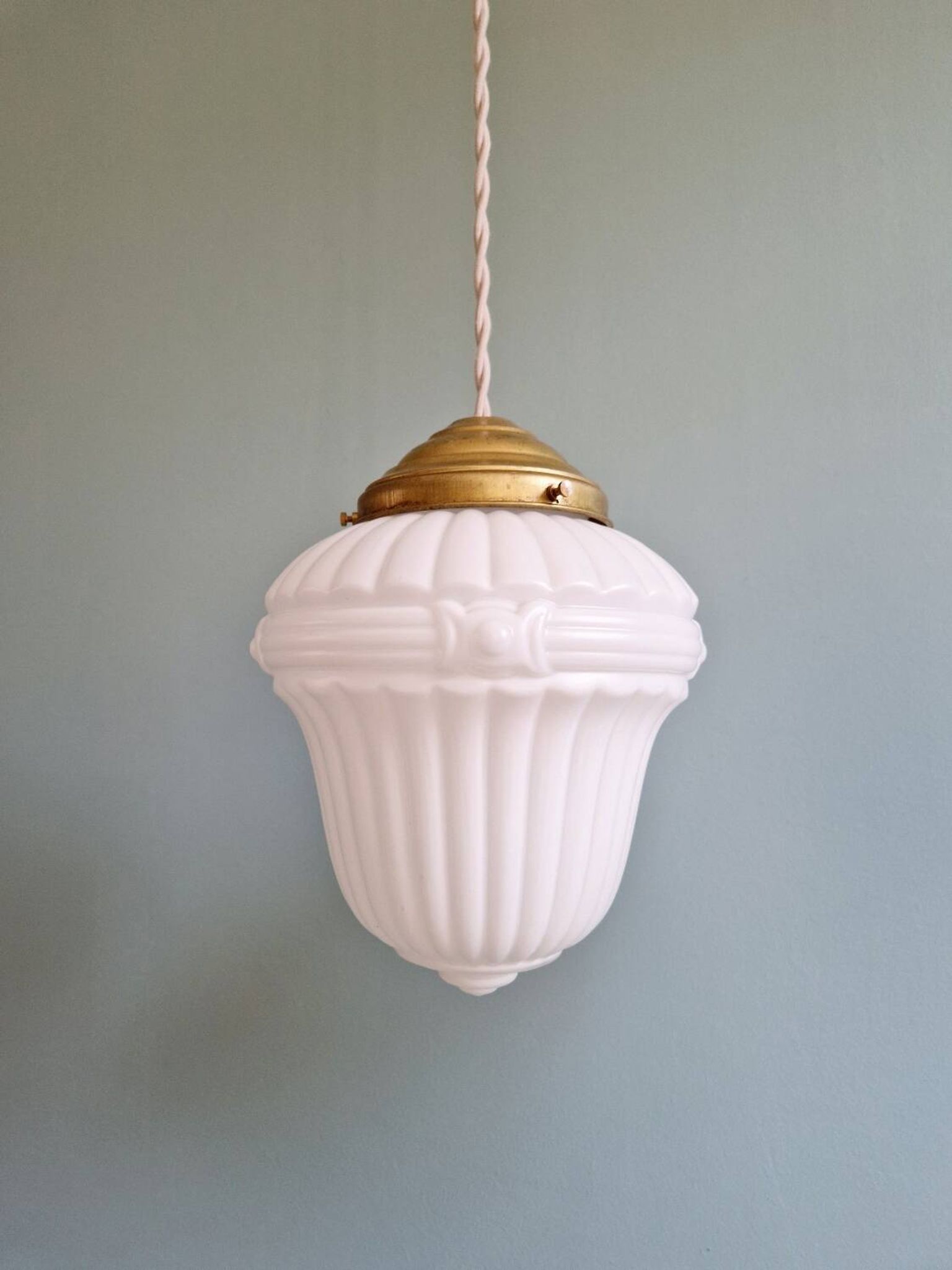 Pair of Art Deco pendant lights in pressed white opaline glass, 1920-30
