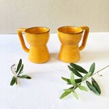 2 tasses en céramique émaillée jaune, signées