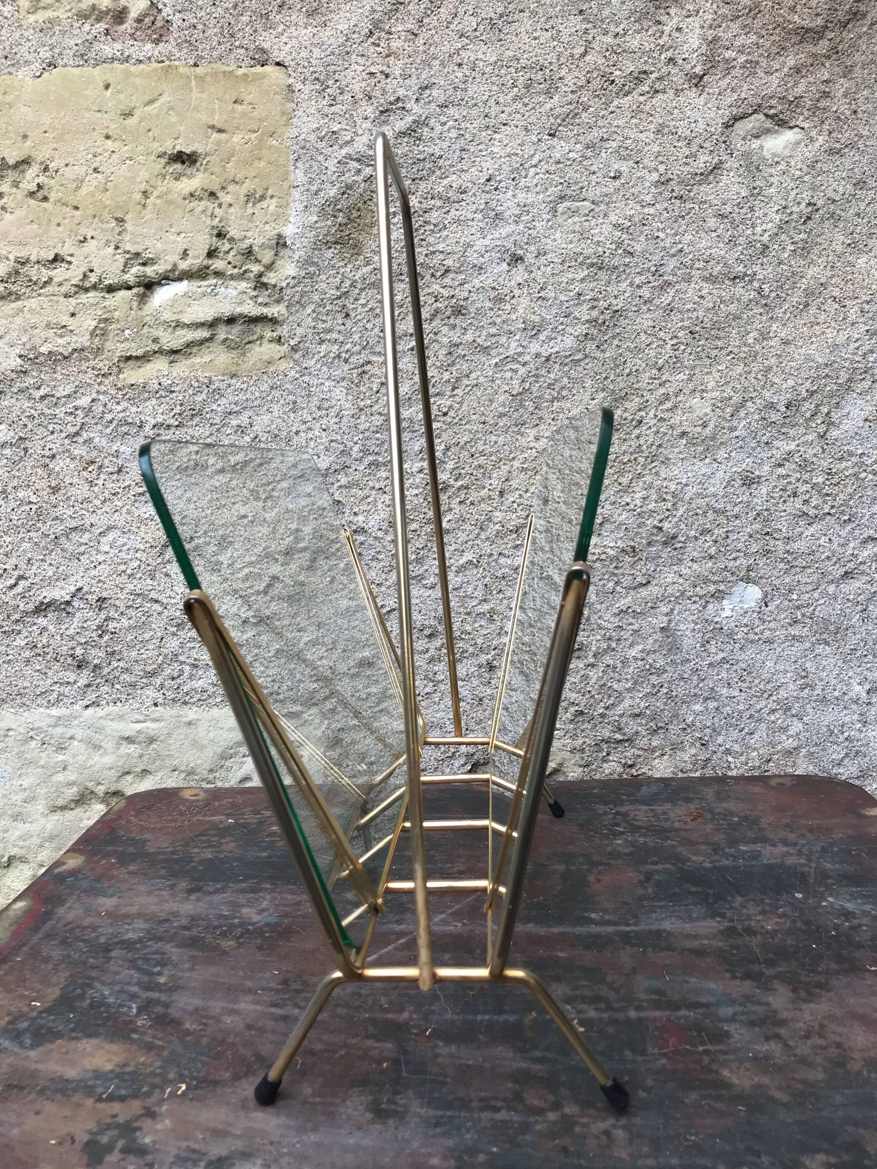 Glass and gold metal magazine door