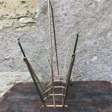 Glass and gold metal magazine door