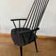 Armchair with armrests and Scandinavian bridge slats
