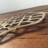 Under the nice brass dish.