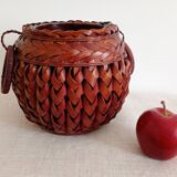 Japanese vase made of woven bamboo. Ikebana.