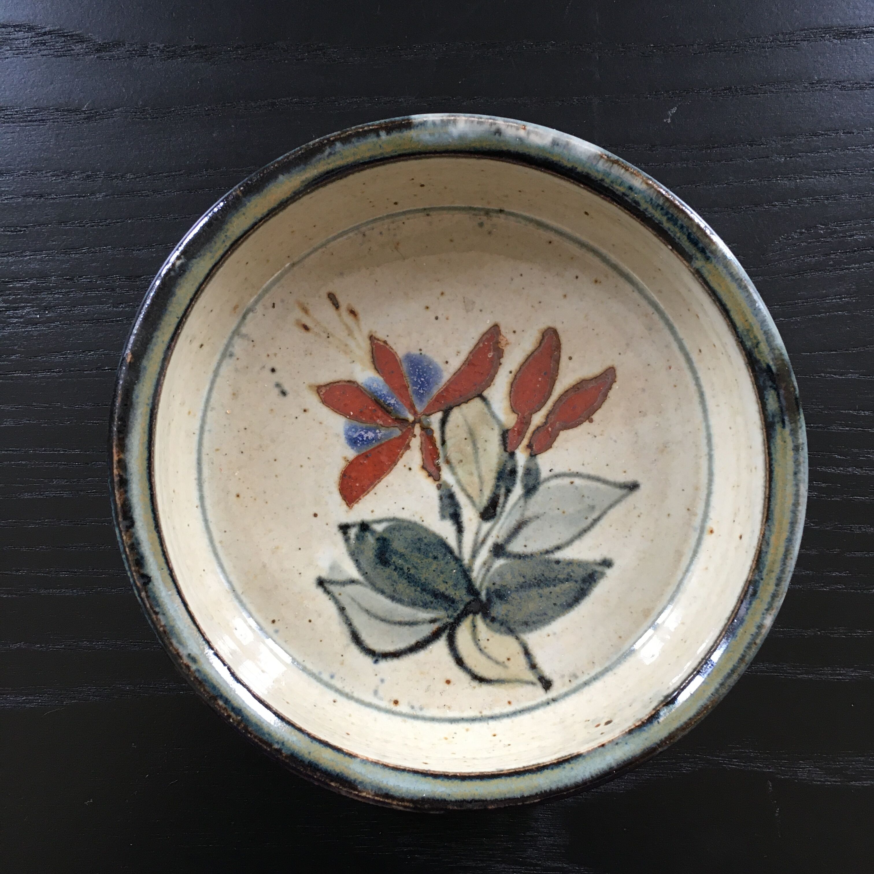 Floral decorated ramekin, signed