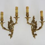 Vintage pair of double wall sconces in bronze from the 1960s.