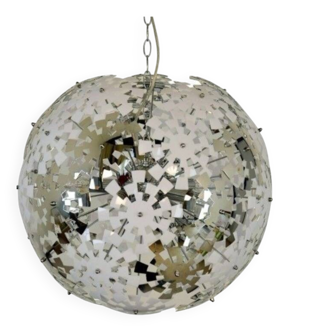Suspension design in the shape of a pixelated chrome flower sphere.