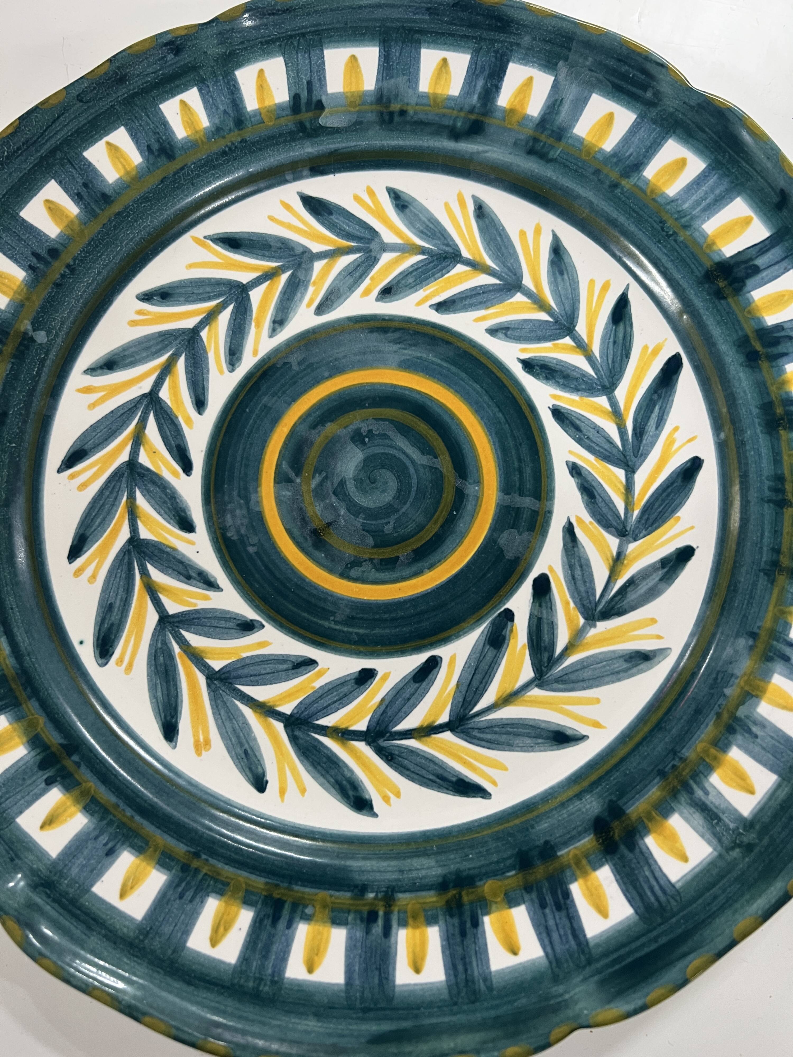 Painted and enamelled ceramic plate