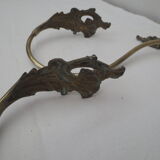 Pair of embraces in numerotée solid brass, rocaille style